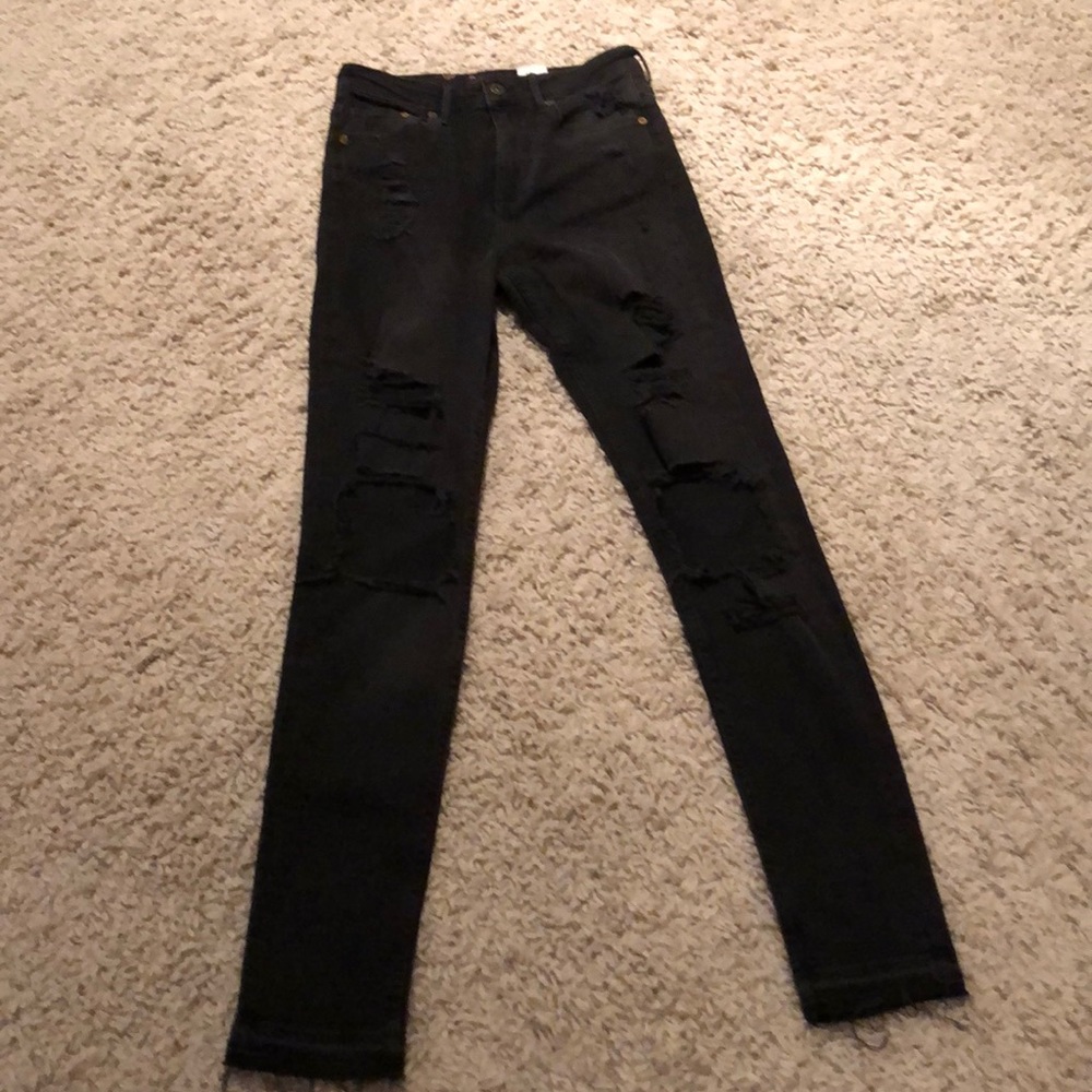 Black jeans with holes